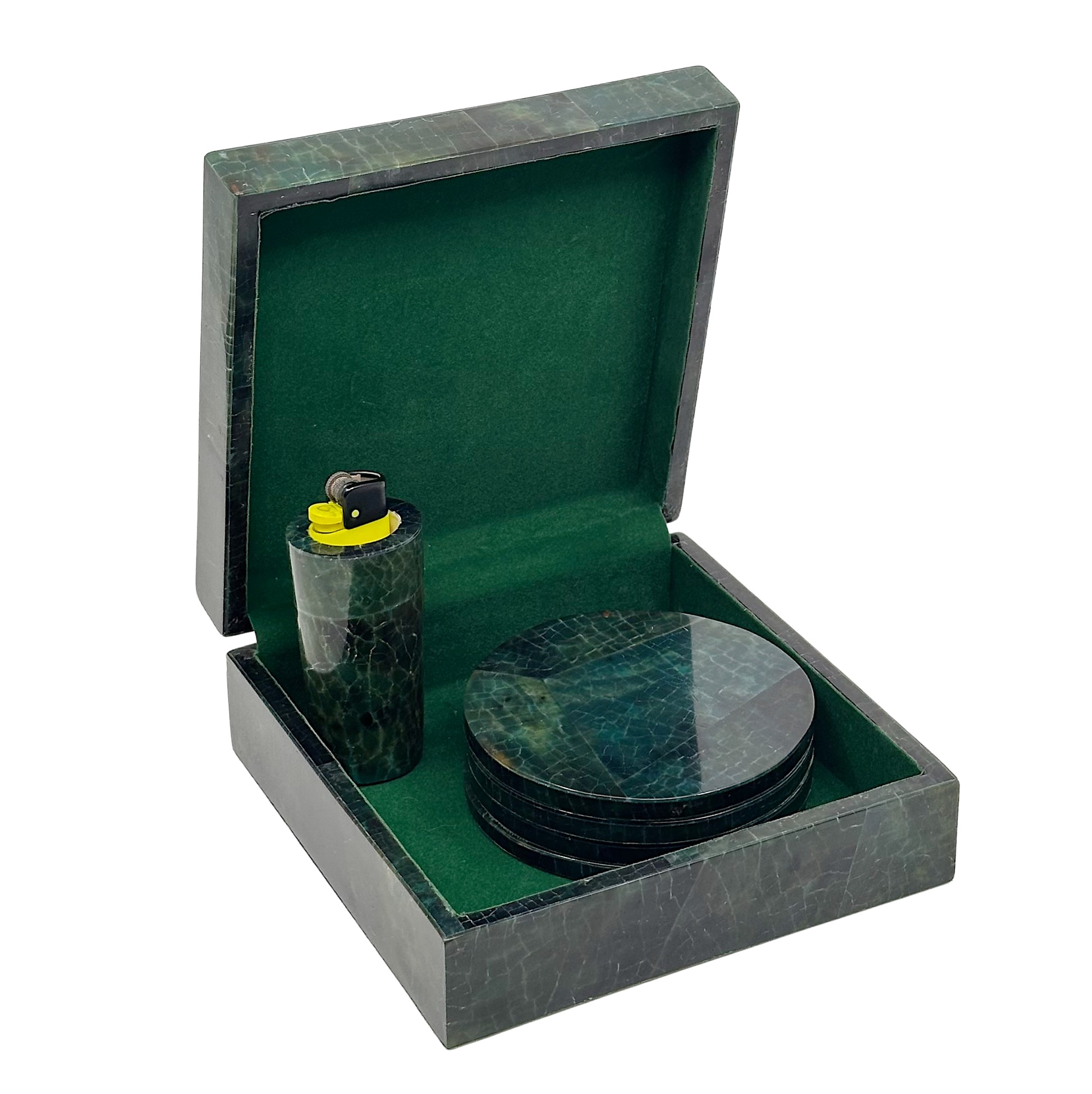 A gift box with a green velvet interior containing a lighter and a coaster, with a marble-like pattern on the interior surfaces.