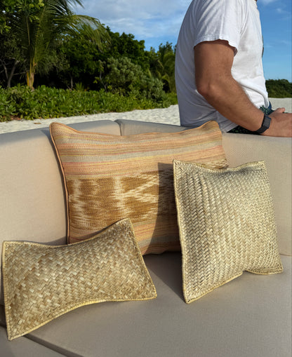 Woven pandan bolster, square and lumbar throw pillows together — Kapalua Living